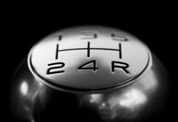 close-up-of-gear-shift-over-black-background-248539